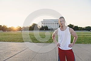 Confident caucasian man resting during workout on the National Mall