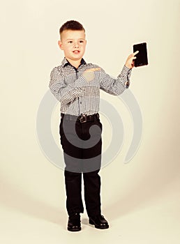 Confident child has business start up. Modern life. small boy with mobile phone. little boss. Ceo direstor. Office life