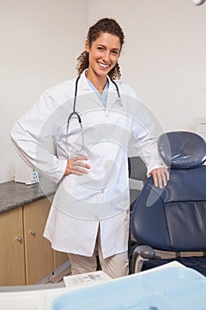 Confident dentist smiling at the camera
