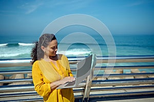 Confident determined business woman, freelance entrepreneur planning startup project, working remotely on laptop