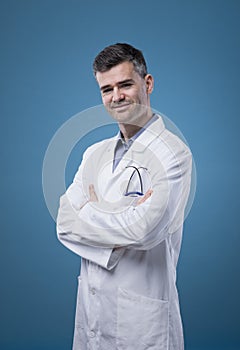 Confident doctor posing