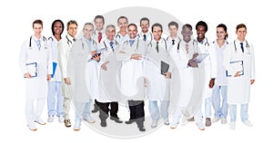 Confident doctors against white background