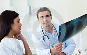 Confident doctors analyzing an x-ray photo