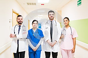 Confident Doctors Standing At Hospital