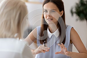 Confident female employer interview candidate at meeting