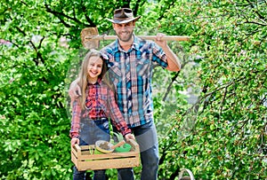 Confident gardener. father and daughter on ranch. spring village country. ecology environment. soils and fertilizers