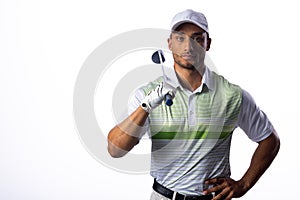 Confident golfer posing with a club, with copy space