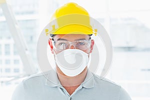 Confident handyman wearing protective workwear