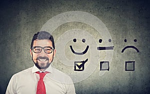 Confident happy business man received excellent rating for a satisfaction survey