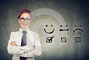 Confident happy business woman received excellent rating for a satisfaction survey