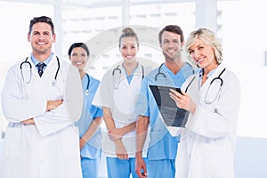 Confident happy group of doctors at medical office