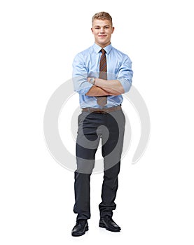 Confident in his abilities. Full body of an ambitious young businessman crossing his arms on a white background.