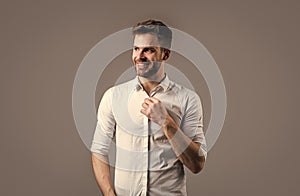 Confident in his style. handsome confident young man standing and smiling in shirt. happy guy smiling. portrait of