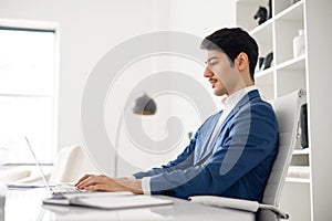 Confident Hispanic businessman in suit