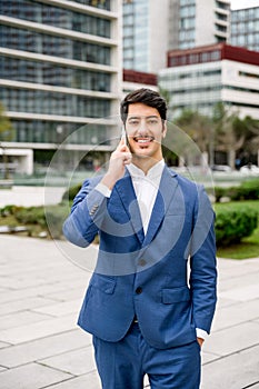 Confident Hispanic businessman in suit
