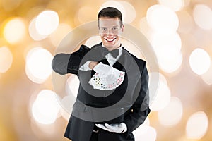 Confident Magician Showing Trick With Playing Cards