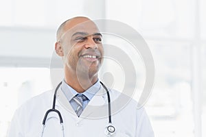 Confident male doctor smiling