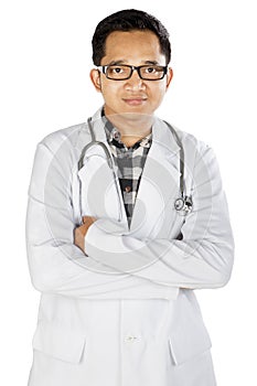 Confident male doctor on studio