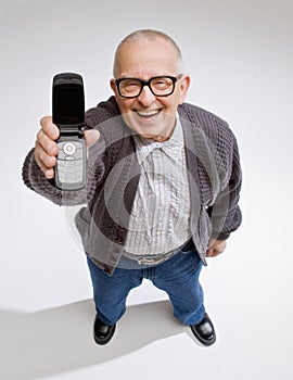 Confident man displaying cell phone