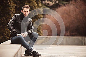 Confident man posing in selvedge jeans