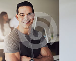 Confident man in small office