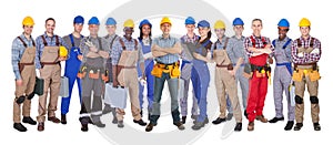 Confident manual workers against white background