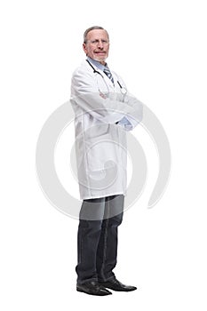 Confident mature doctor with arms crossed looking away