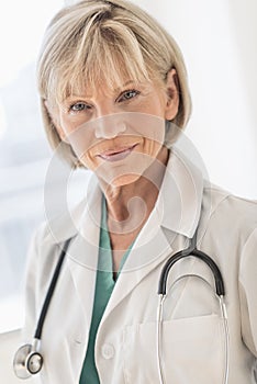 Confident Mature Female Doctor In Hospital