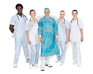 Confident medical team against white background
