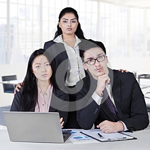 Confident multi ethnic business team in office