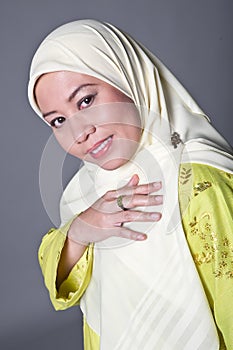 Confident Muslim woman in scarf, isolated.