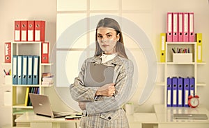 Confident office worker. secretary with document folder. formal fashion style. woman with makeup. sexy girl in jacket