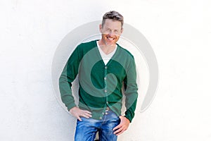 Confident older man smiling isolated on white background