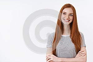 Confident outgoing creative young redhead girl cross hands chest look amused thoughtful, pondering carefully interesting