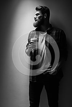 Confident perfect hairstyle man having coffee