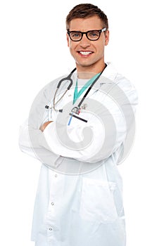 Confident physician posing with arms crossed