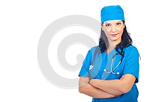 Confident physician woman with hands crossed