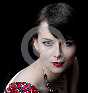 Confident portrait of a young woman in red