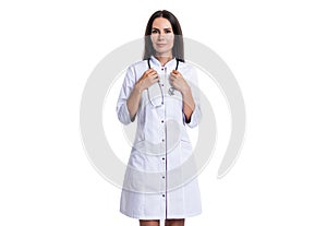 Confident practitioner doctor standing in medical office. general practitioner with stethoscope. medicine, healthcare