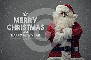 Confident Santa Claus and Christmas wishes