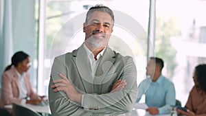 Confident senior Indian business man leader standing at office meeting. Portrait