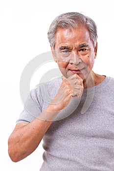 Confident senior man thinking, looking at you