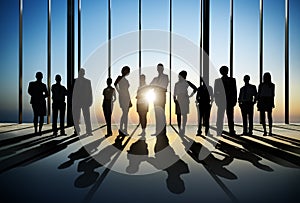 Confident Silhouette Of Business People Posing For The Camera In