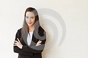 Confident and smart female business executive with text space