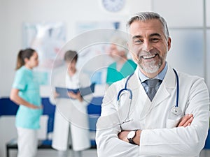 Confident doctor posing at the hospital photo