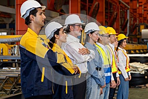 Confident and smiling lineup of factory worker, engineer, manager. Exemplifying