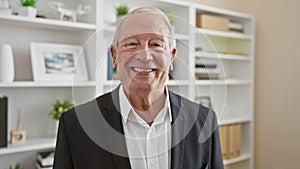 Confident and smiling senior man making business magic, radiating joy as he works succeeding at the office