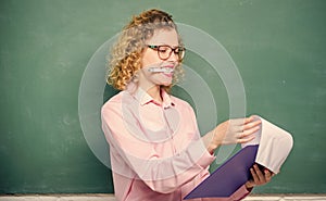 confident student in glasses at blackboard. girl teacher at private lesson. report project. back to school. essay