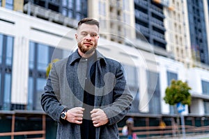 Confident successful businessman in fashionable city. Portrait of handsome stylish businessman outdoor lifestyle.