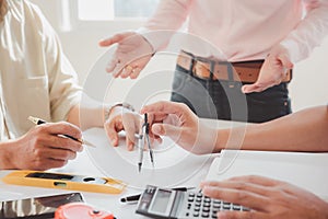 Confident team of architect working together in a office.